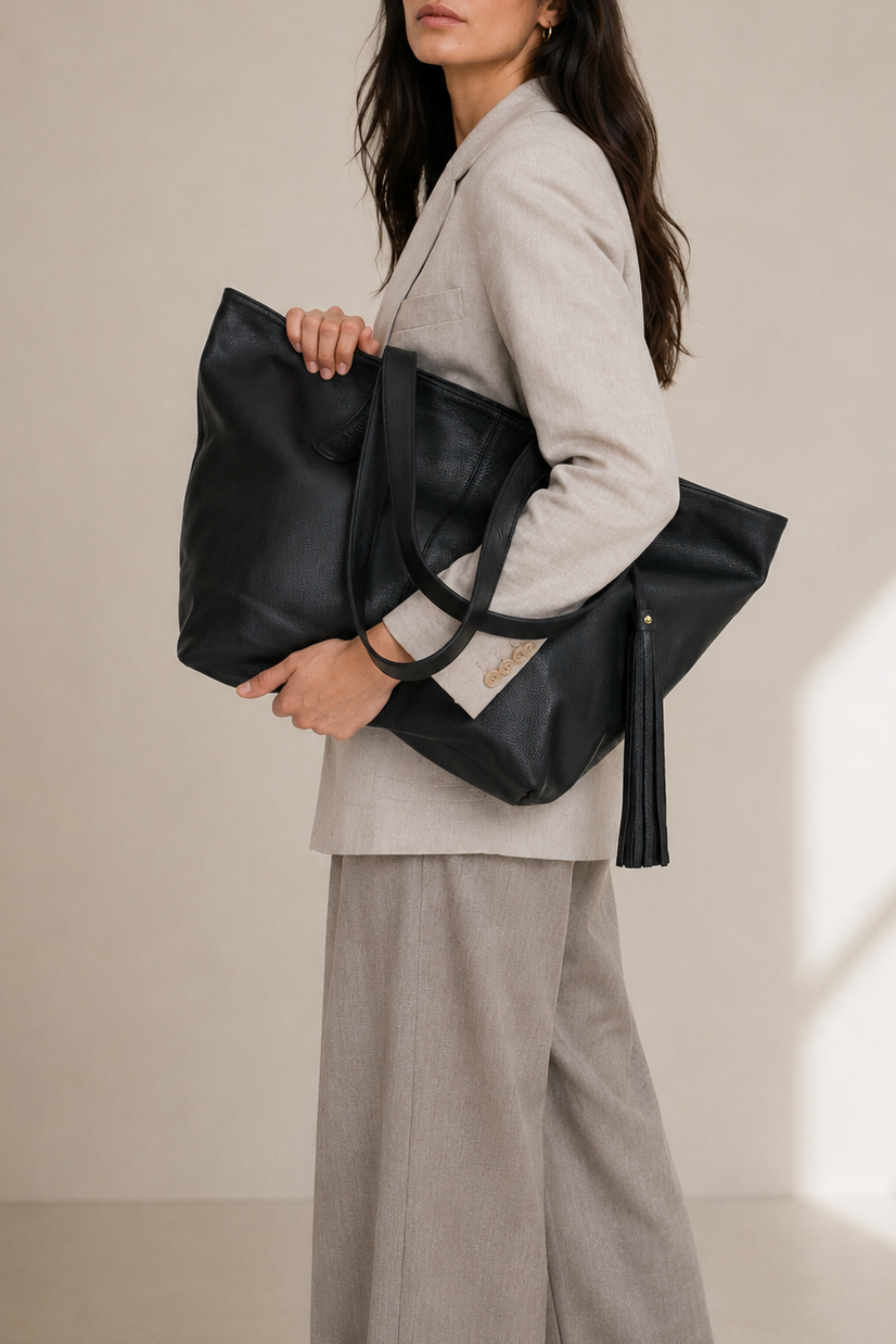 black zippered light weight travel tote bag Margot Carryall | Full-Grain Leather Work Tote Abu Garcia 5500C3 2-Speed with a trolley sleeve Prop Style:NO Prop conventional lever drag reels
