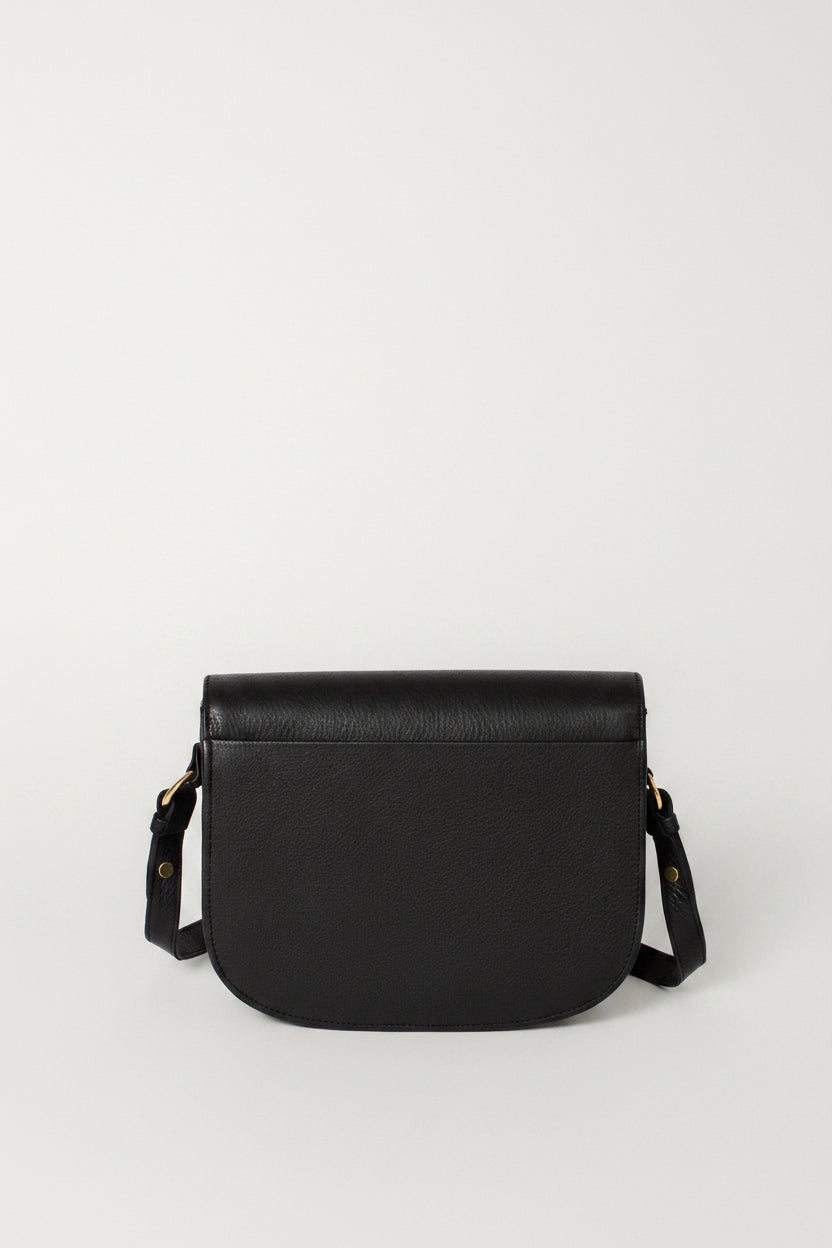 Handcrafted leather saddle bag in the color black with outside pocket for cell phone