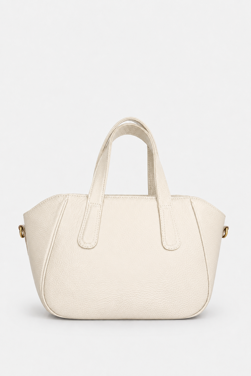 An off-white pebbled leather handbag with double top handles and small gold-tone hardware, shown against a plain light gray background.