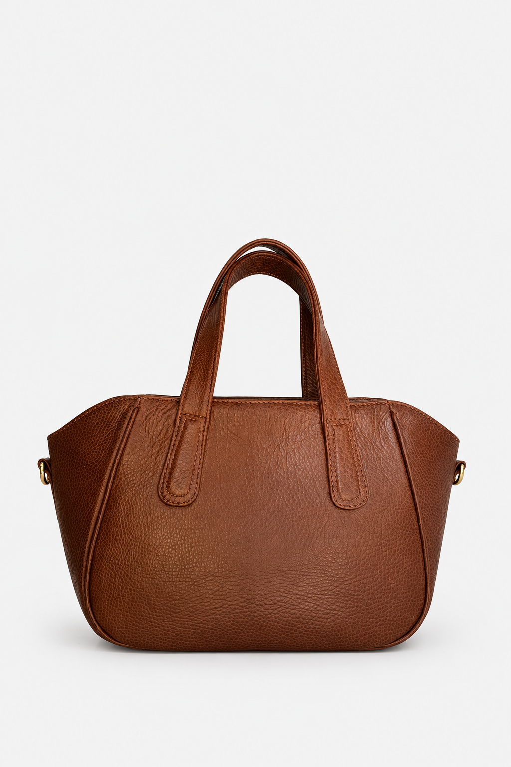 A brown textured leather handbag with double top handles and small gold-tone hardware, photographed against a clean light gray background.