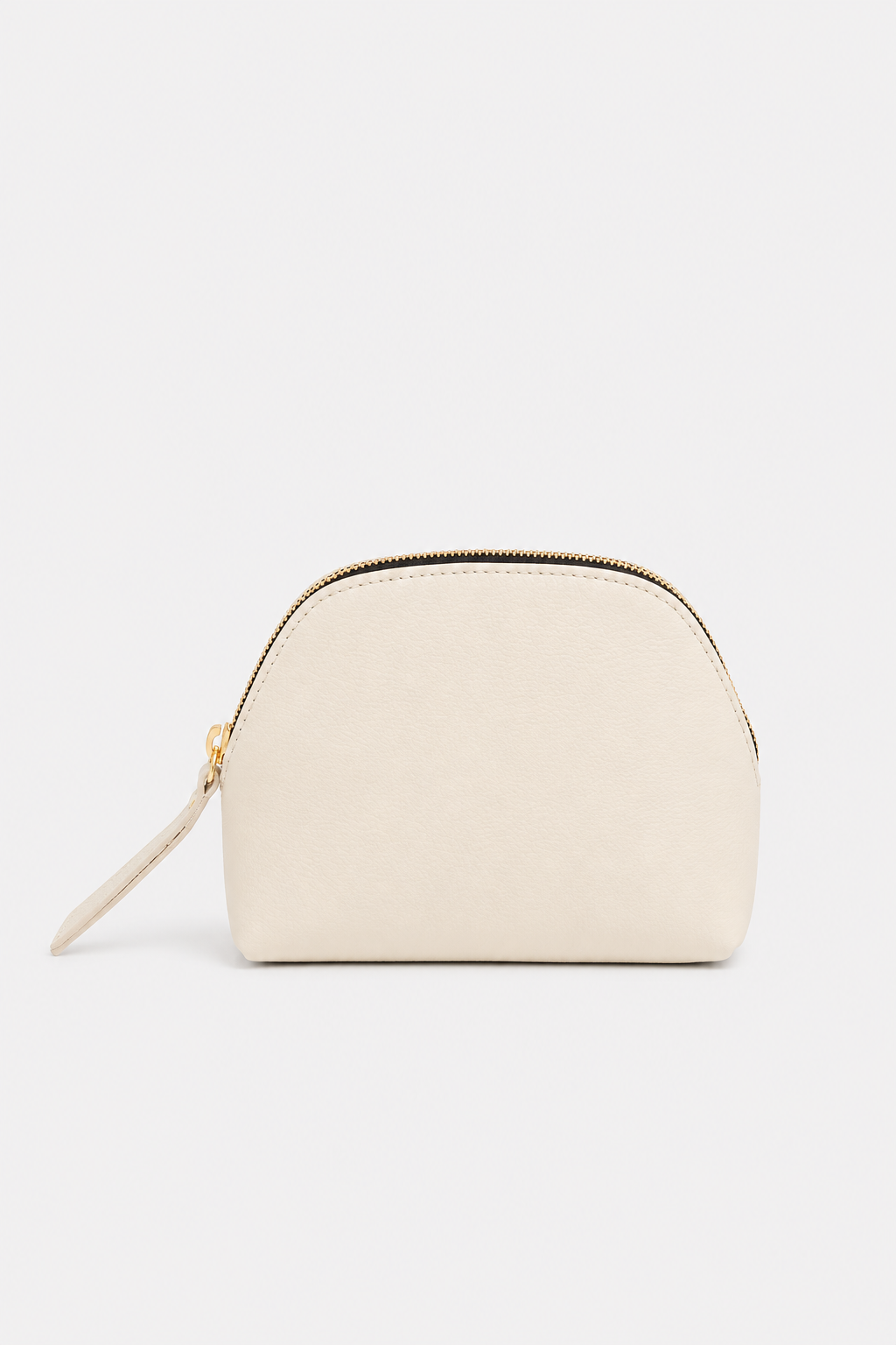 A small, dome-shaped cosmetic pouch in a light cream color with a gold zipper and a matching wristlet strap, shown against a plain white background.