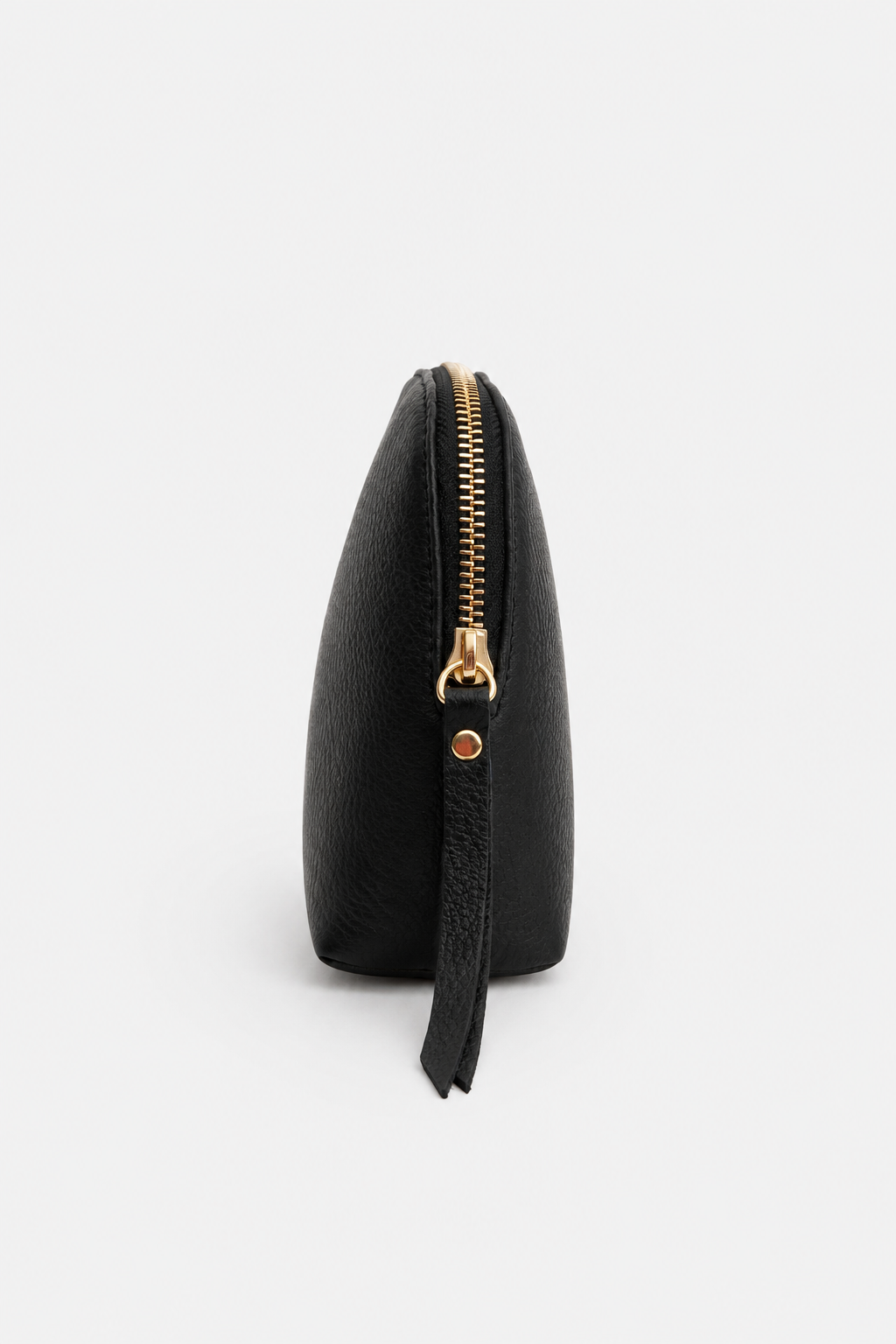 Black Leather Cosmetic Pouch with gold hardware details and a long leather pull
