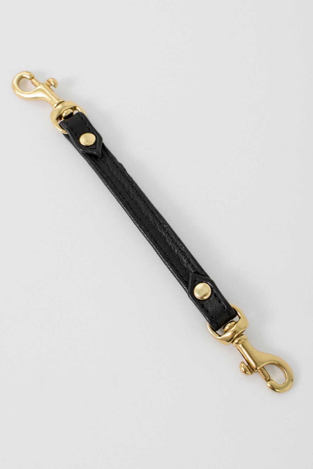 Black Leather extender with two gold clasps 