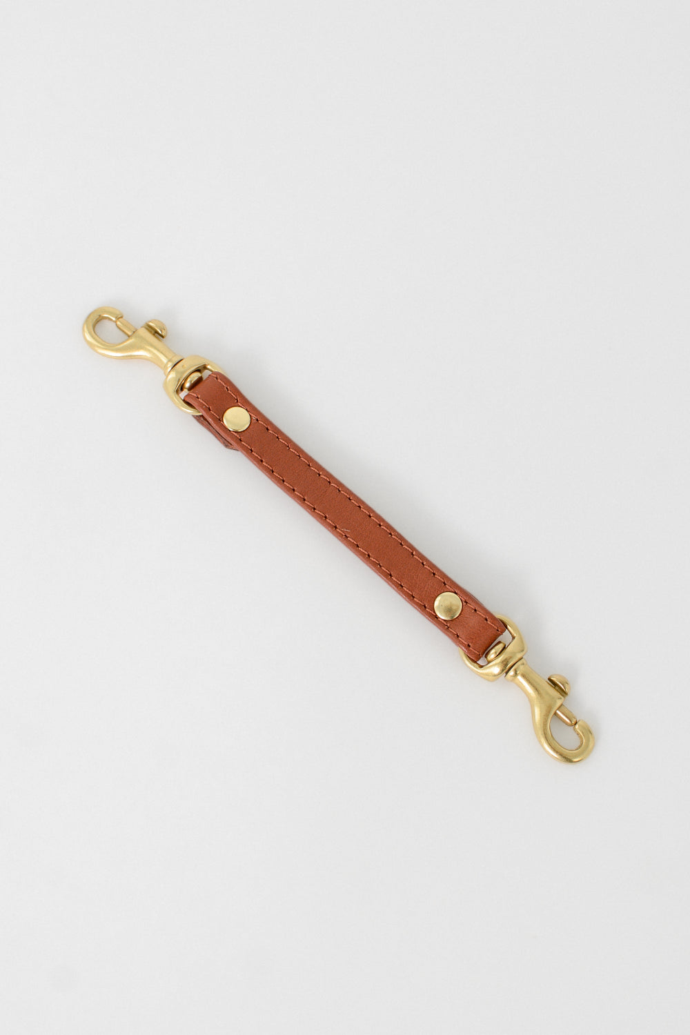 Brown Leather extender with two gold clasps 