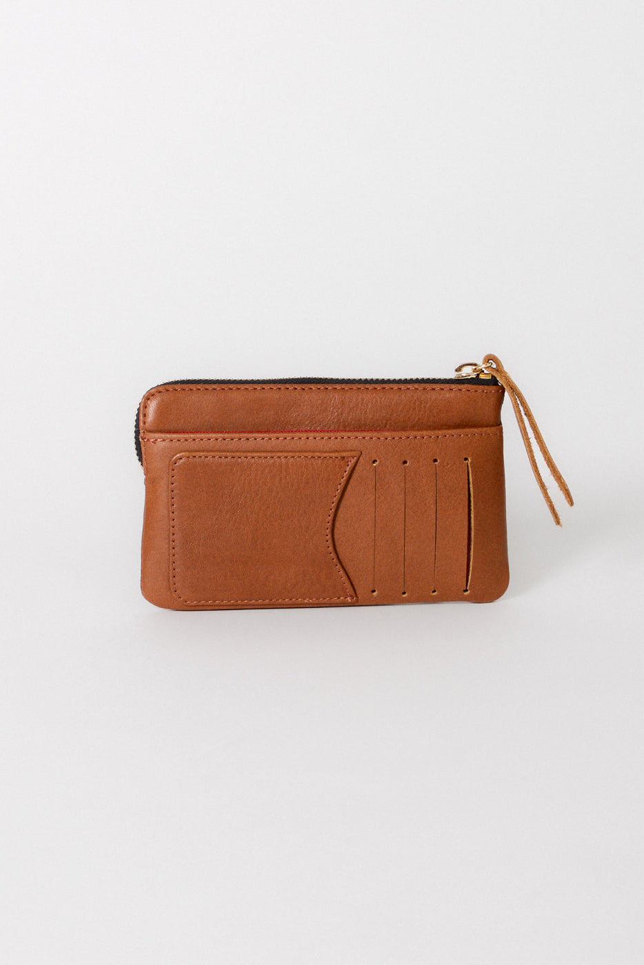 A brown leather zip-around wallet with card slots and a zipper pull, photographed on a clean white background.