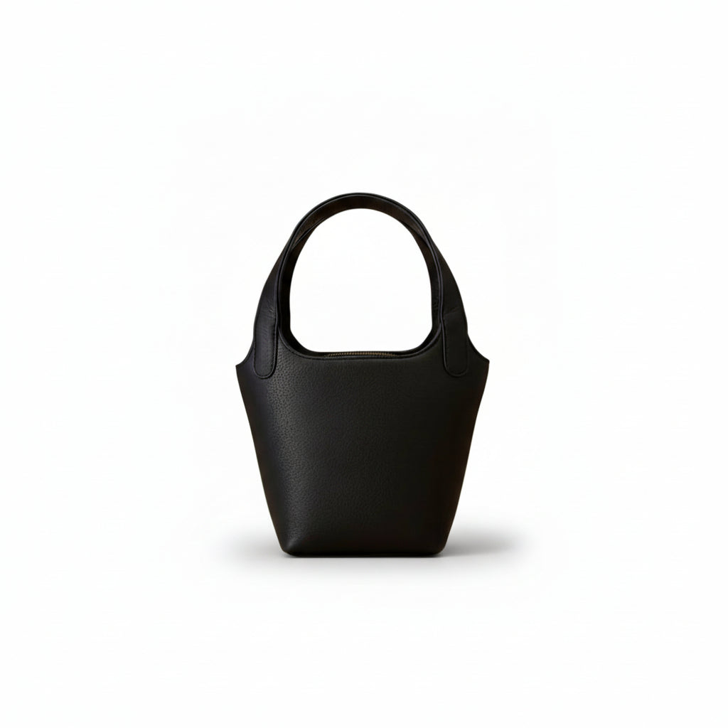 Black handbag on a white background