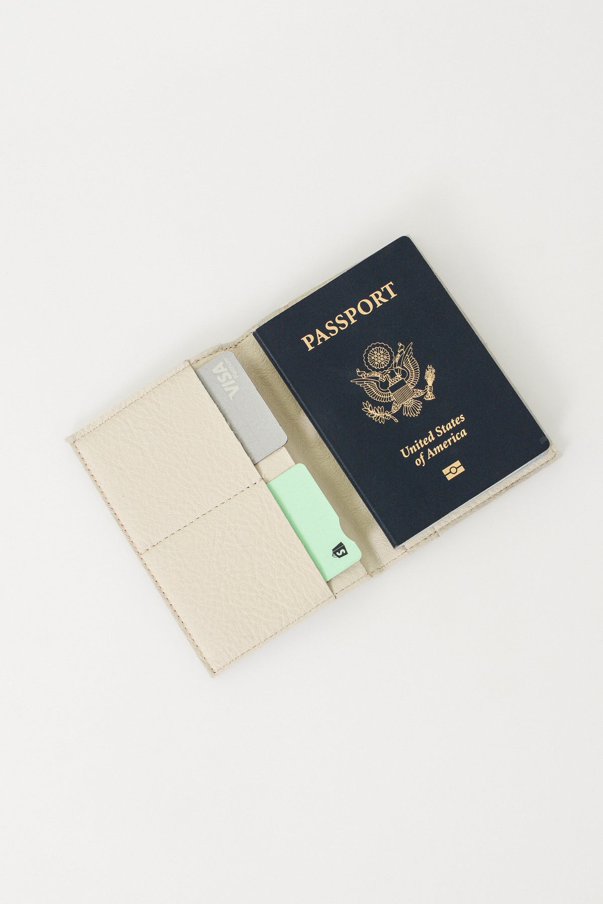 Passport and travel document holder on a white background. This is a passport wallet.