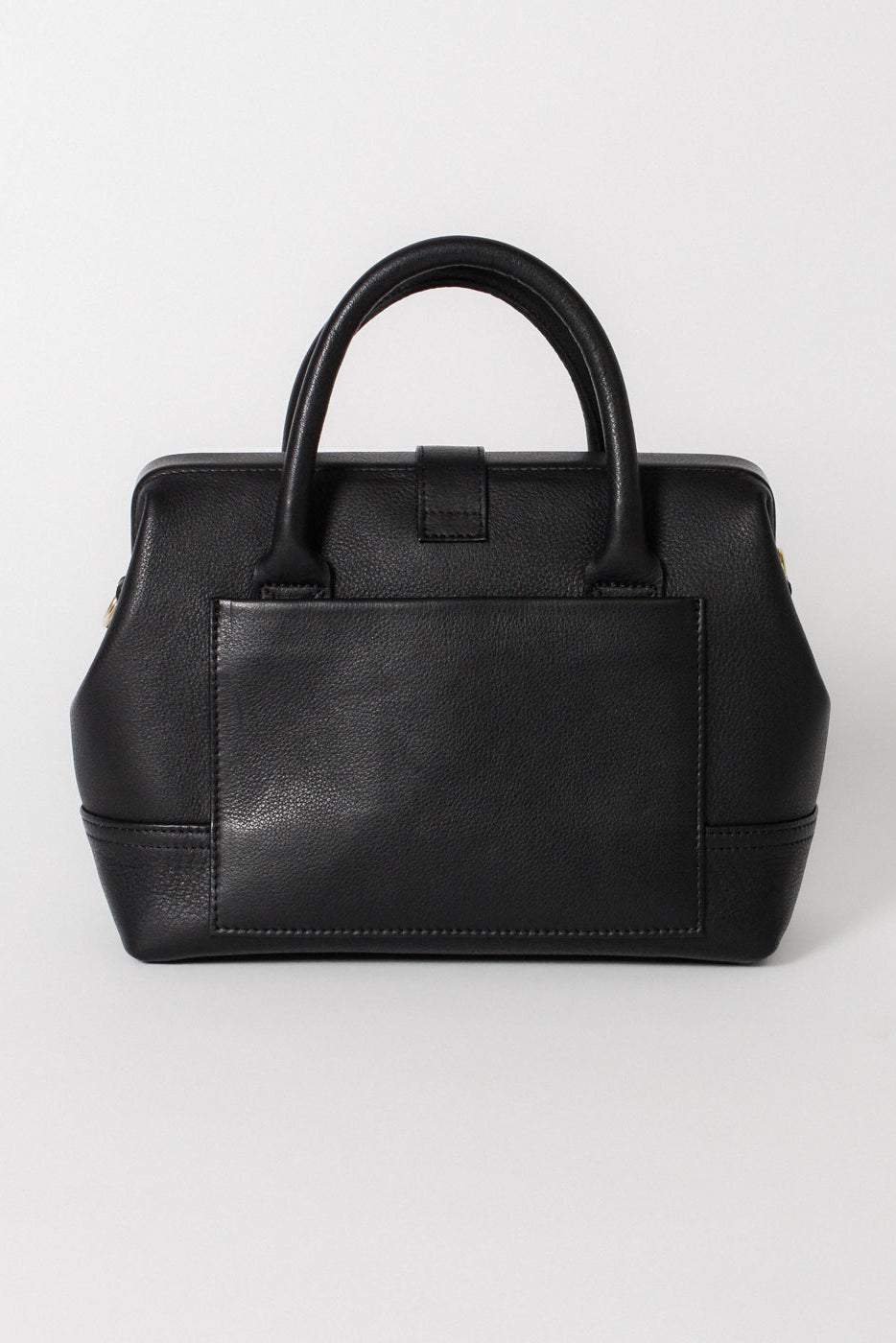 Back view of the Doctor Bag in black leather, featuring a structured silhouette with a clean exterior pocket and top handles.
