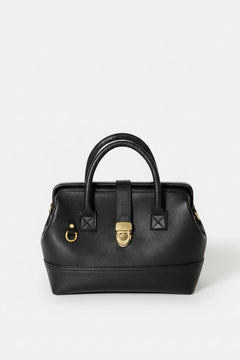 Front-facing hero image of the Doctor Bag in black leather, featuring structured top handles, a framed silhouette, and a polished gold clasp closure.