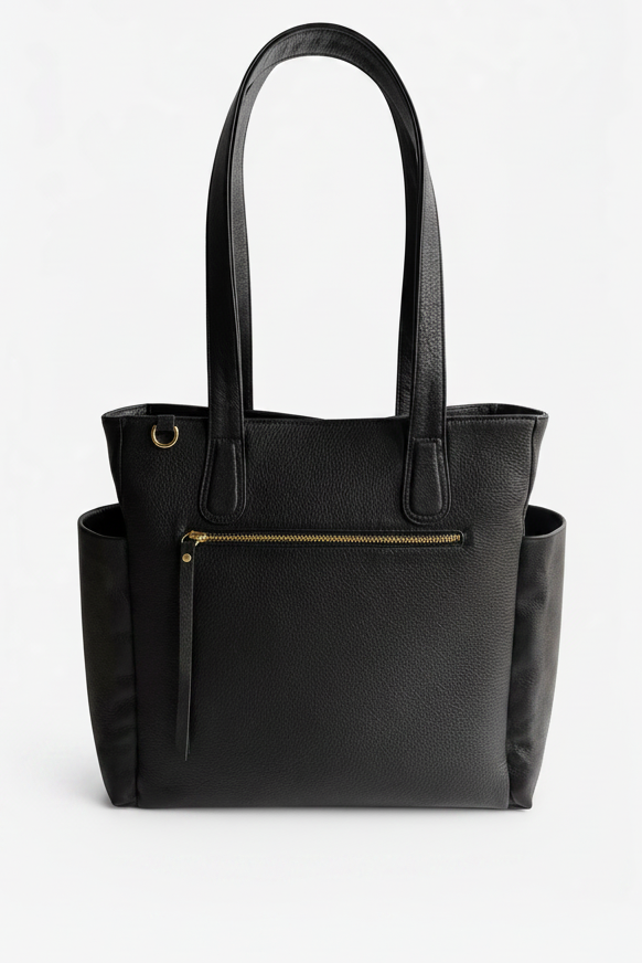 Black leather Emily Tote with structured shape, long shoulder straps, and a front zip pocket, designed for work and travel.