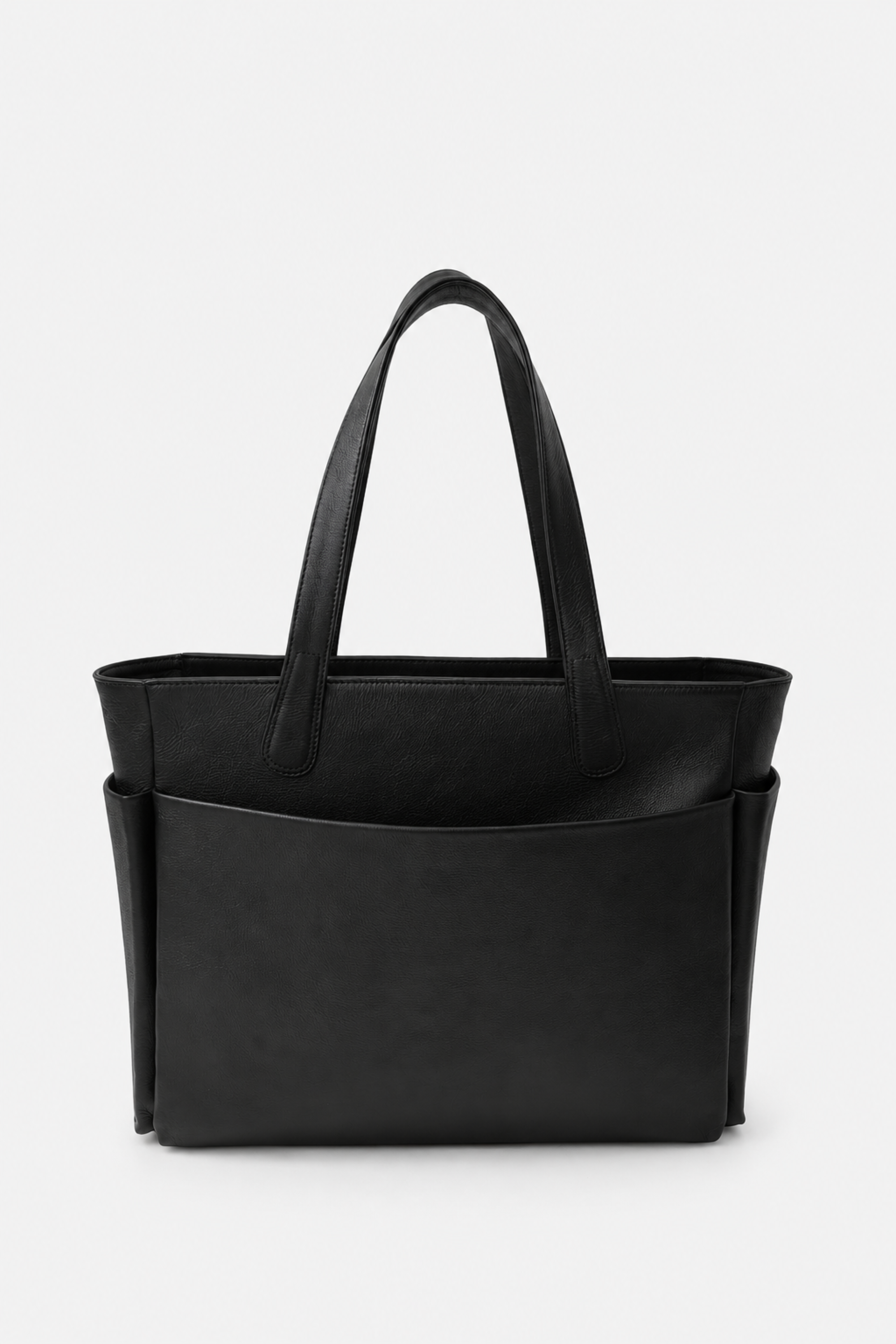 Front view of the TAH Mari Oversized Structured Tote in black full-grain leather with long shoulder straps and a large exterior slip pocket. 